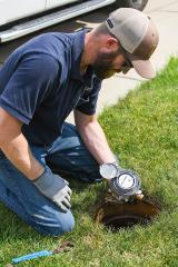 Employee working on meter upgrades.