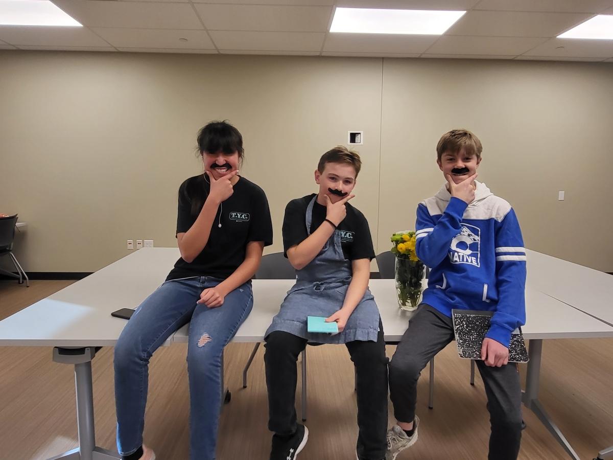 Three boys acting silly at Thornton Youth Council